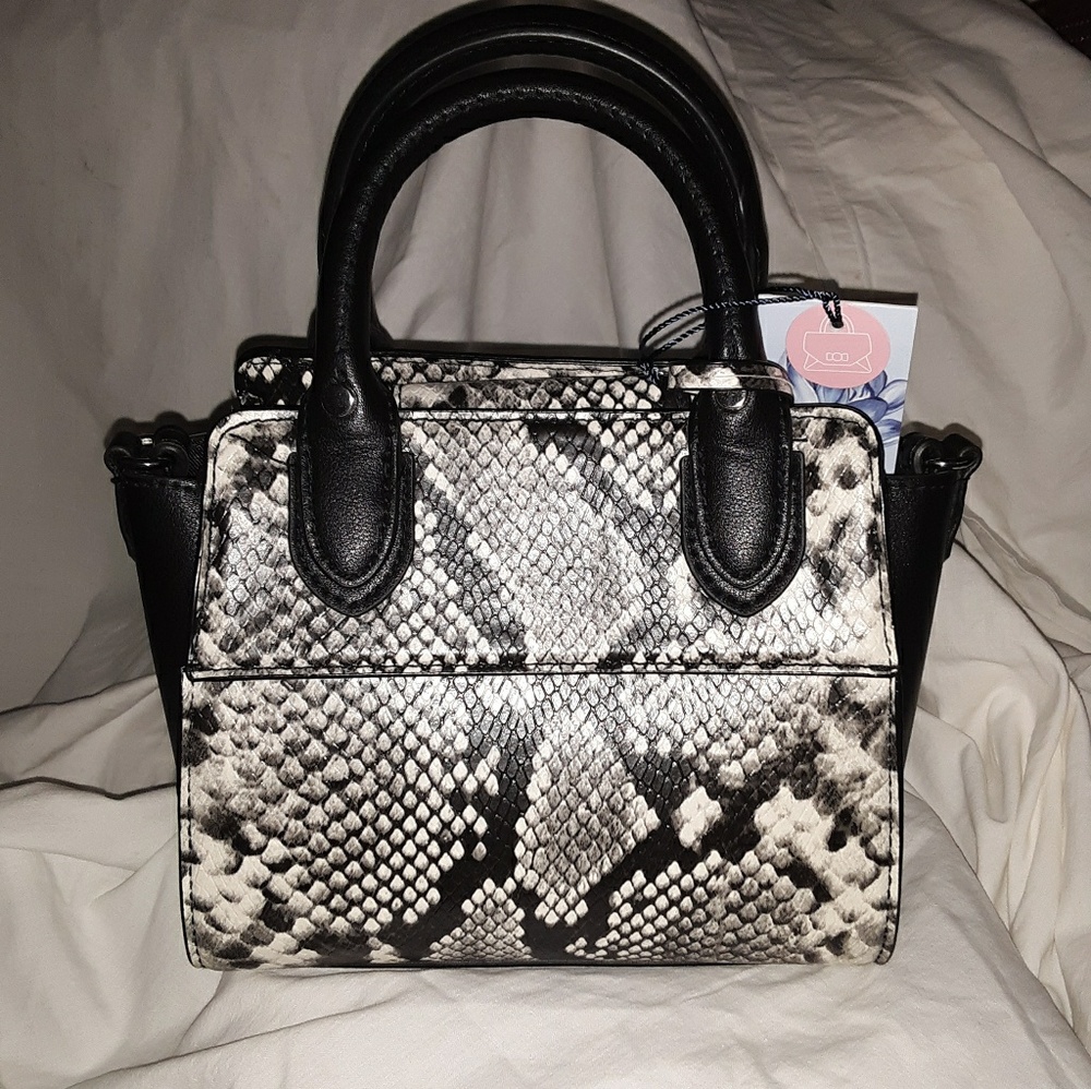Brand new with tags.Small Crossbody Tote
